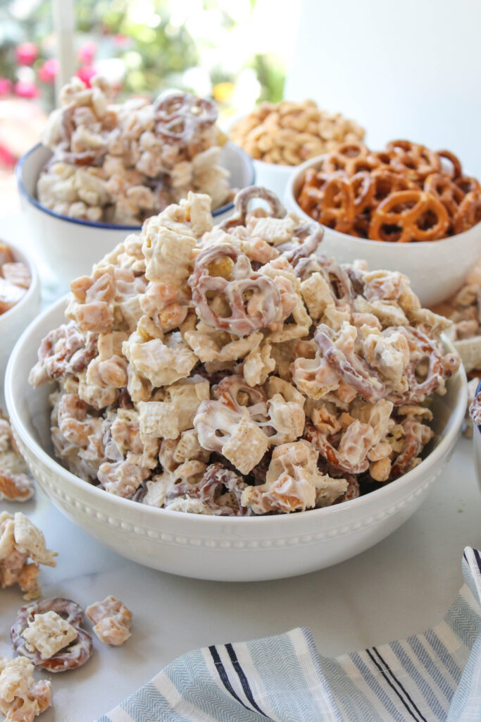 White Trash Party Mix coated in white chocolate and served in a bowl
