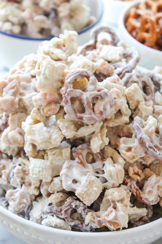 Homemade White Trash Party Mix filled with cereal, pretzels, and candy