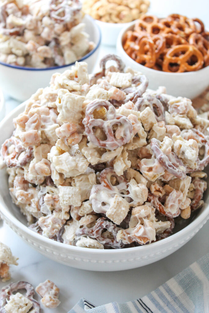Homemade white chocolate party mix ready for holiday entertaining