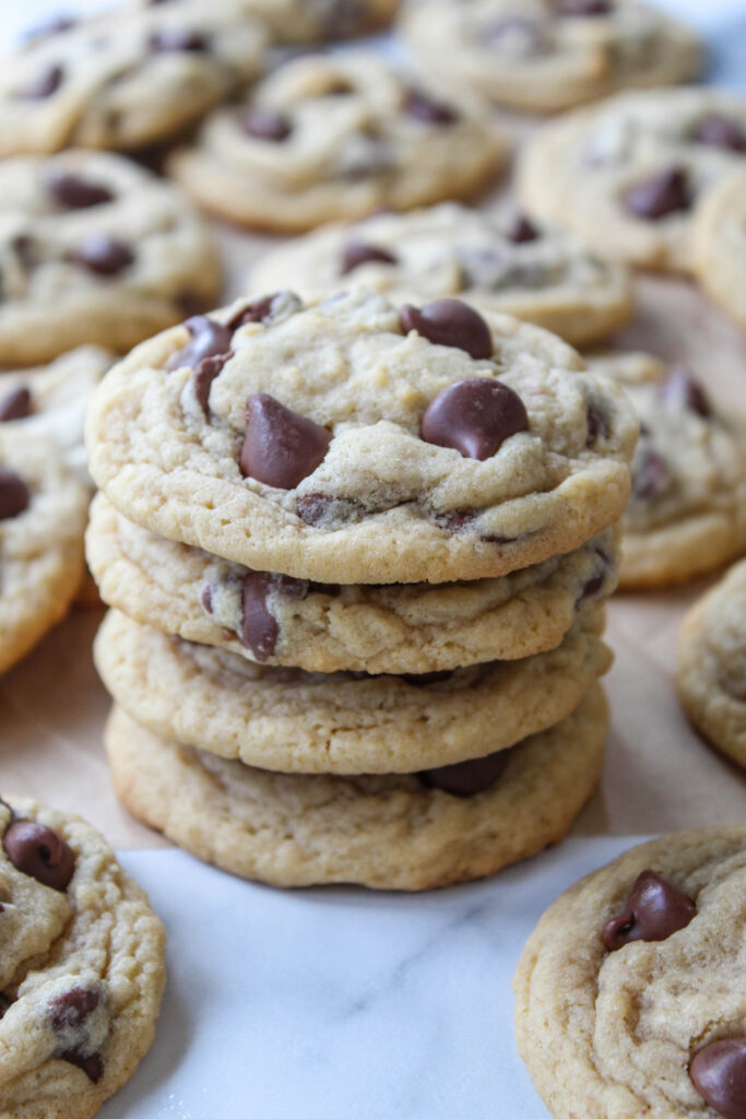 Stack of soft chocolate chip cookies with gooey centers