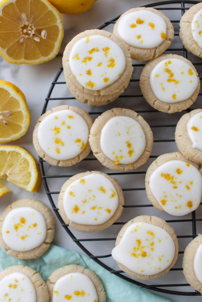 Lemon meltaway cookies with lemon icing and fresh lemon zest