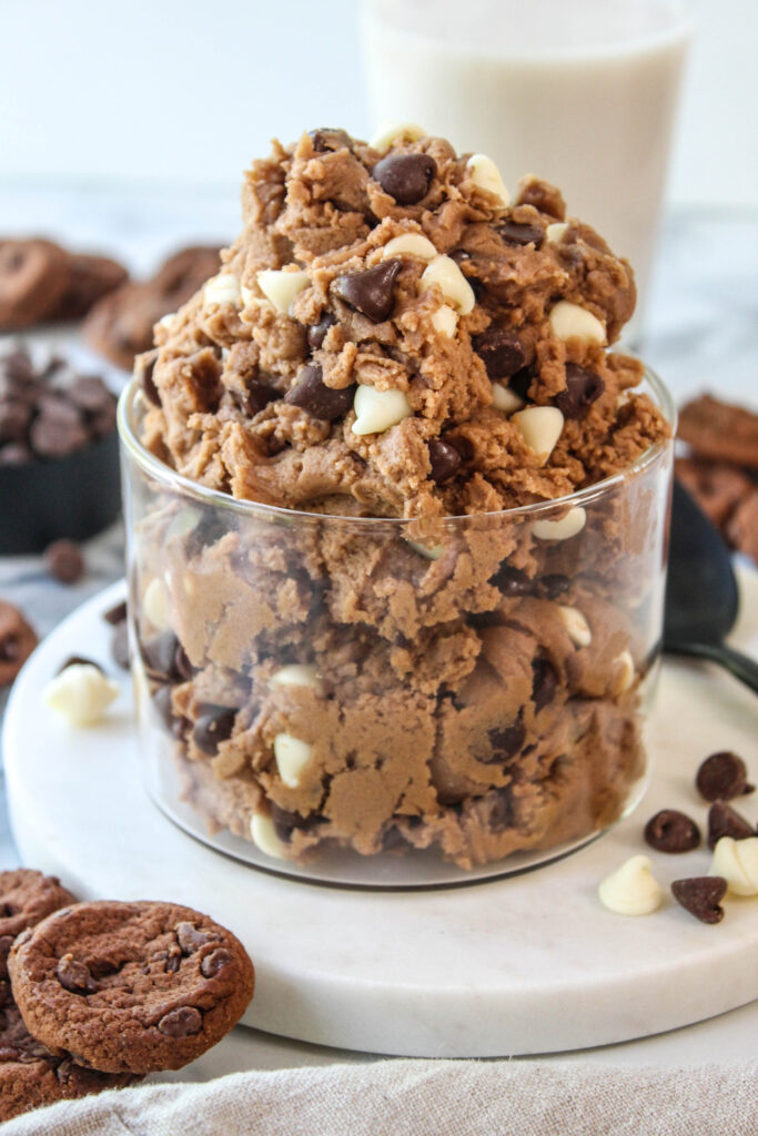 Edible chocolate cookie dough topped with milk and white chocolate chips