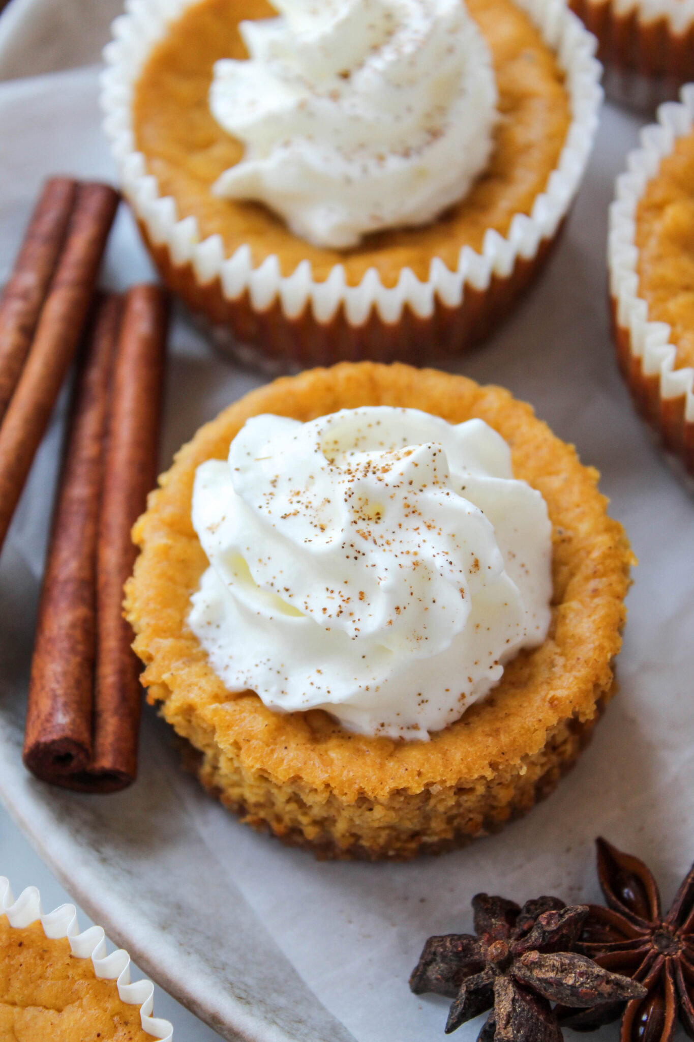 Mini Pumpkin Cheesecakes - Baking You Happier