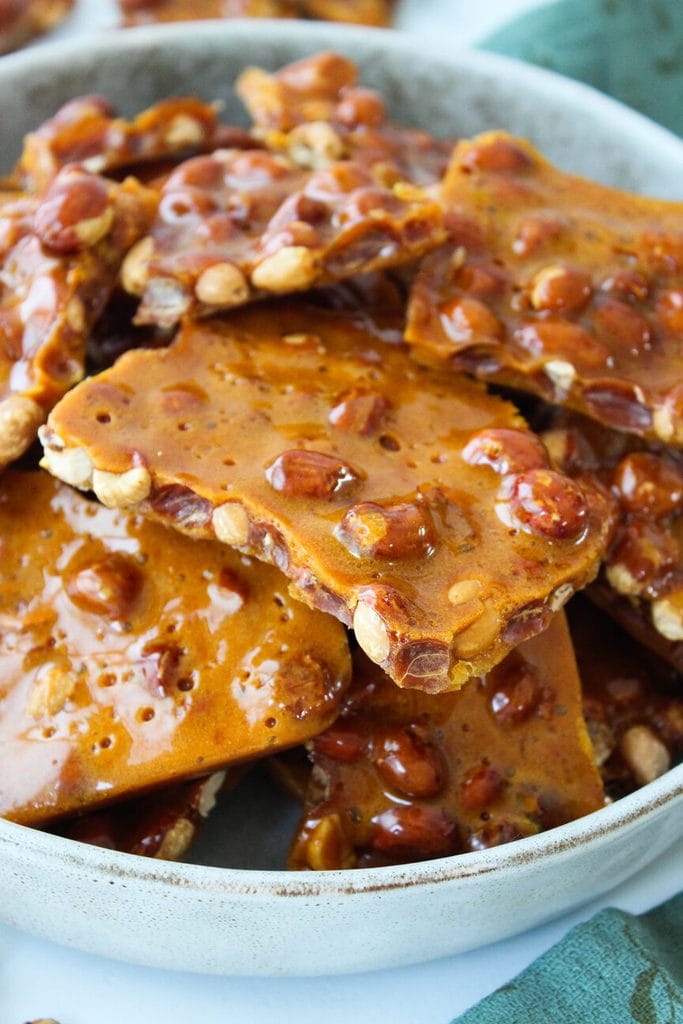 Peanut brittle candy with deep caramel color and shiny finish