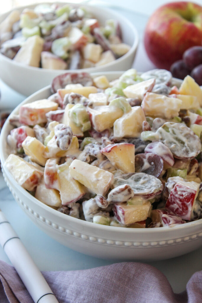 Classic Waldorf salad with apples, grapes, celery, and pecans in a creamy dressing