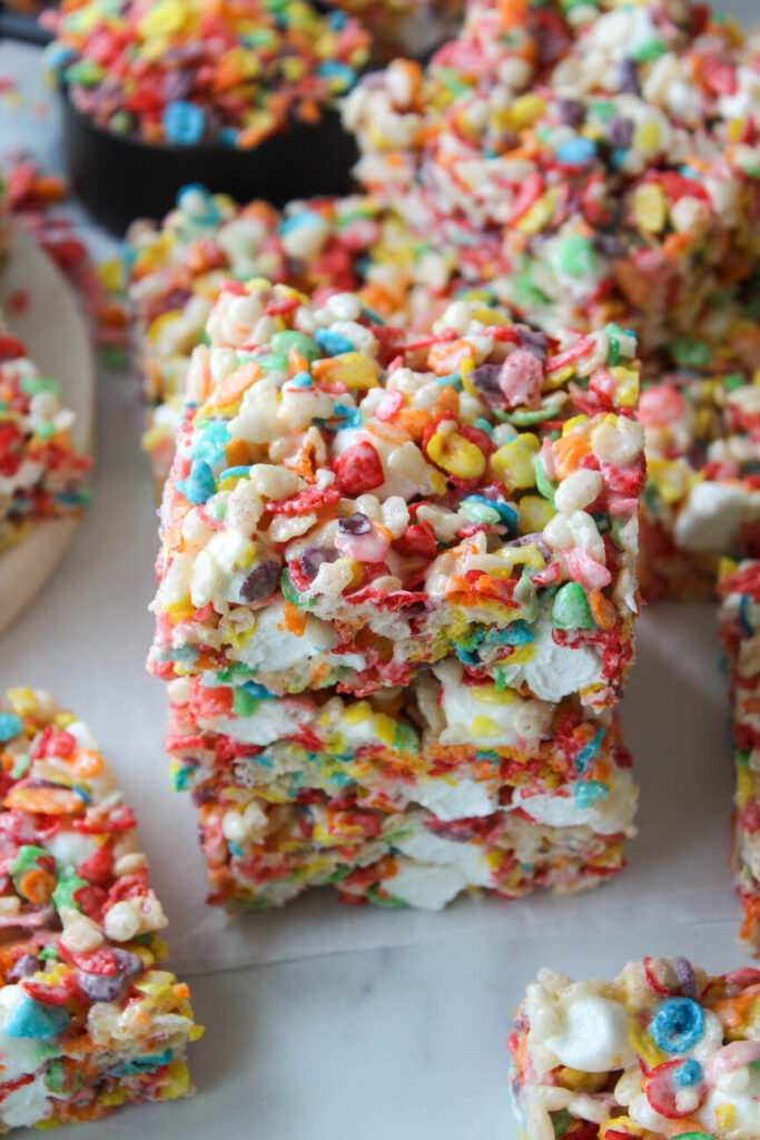 Chewy Fruity Pebbles Rice Krispie treats made with marshmallows and colorful cereal
