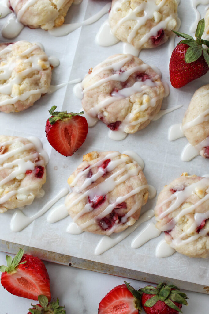 Strawberry shortcake cookies topped with white chocolate drizzle
