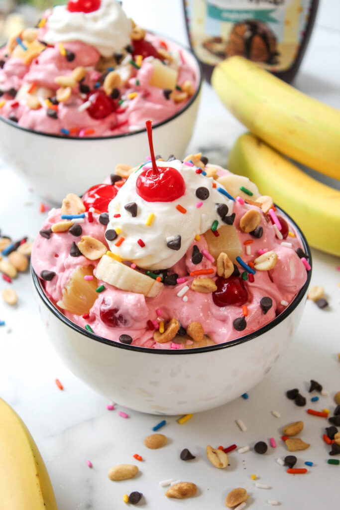 Banana split fluff dessert with fruit and whipped topping