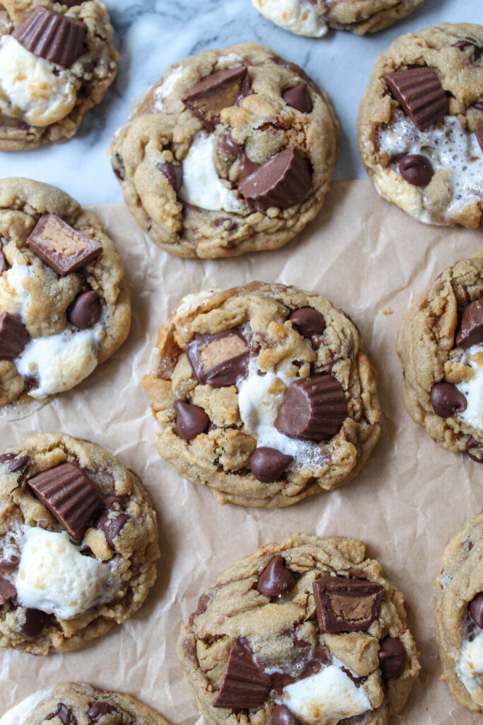 Warm, homemade cookies packed with chocolate chips, marshmallows, and Reese’s peanut butter cups