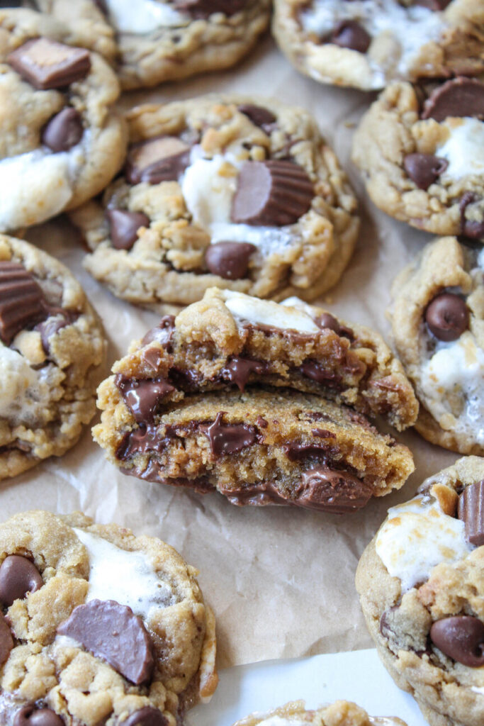 Freshly baked peanut butter cup cookies with chocolate chips and toasted marshmallows