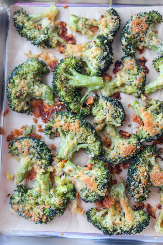 Crispy smashed broccoli pieces finished with a light dusting of parmesan cheese