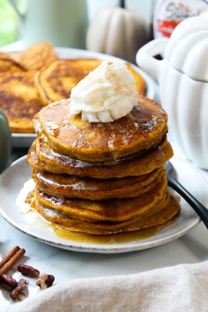 Soft pumpkin pancakes with a fluffy interior and crisp golden edges