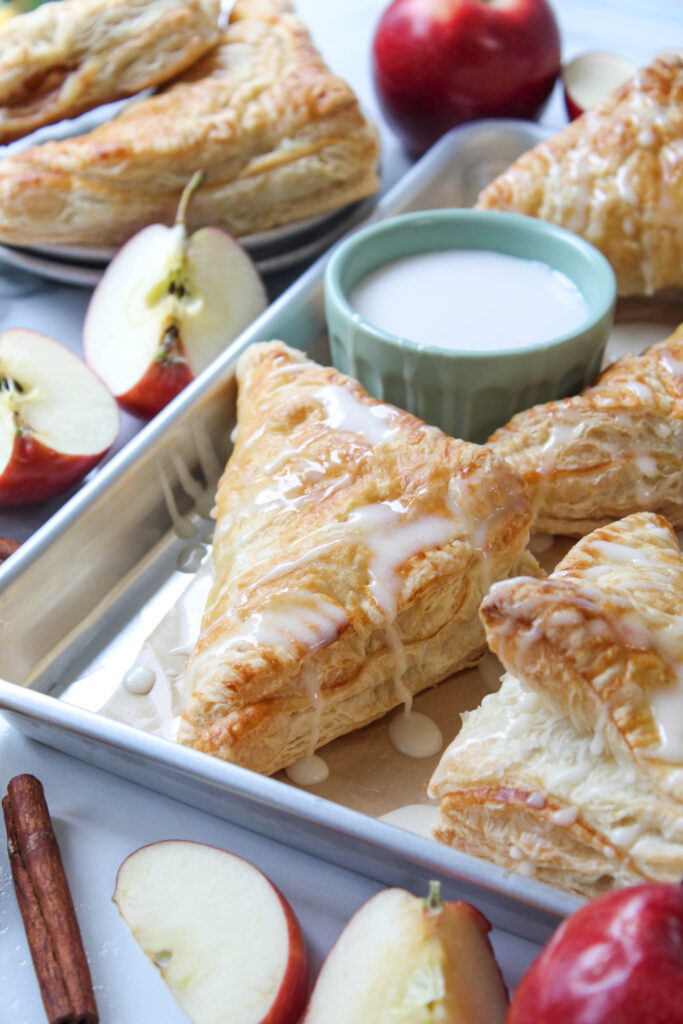 Golden brown apple turnovers made with flaky puff pastry