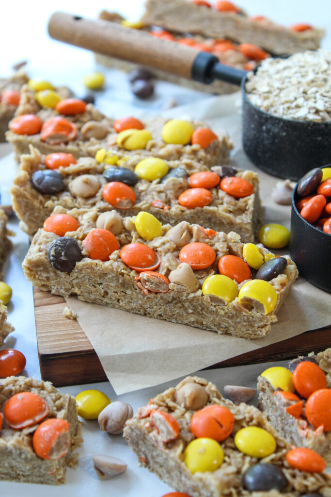 Homemade peanut butter granola bars stacked on a plate
