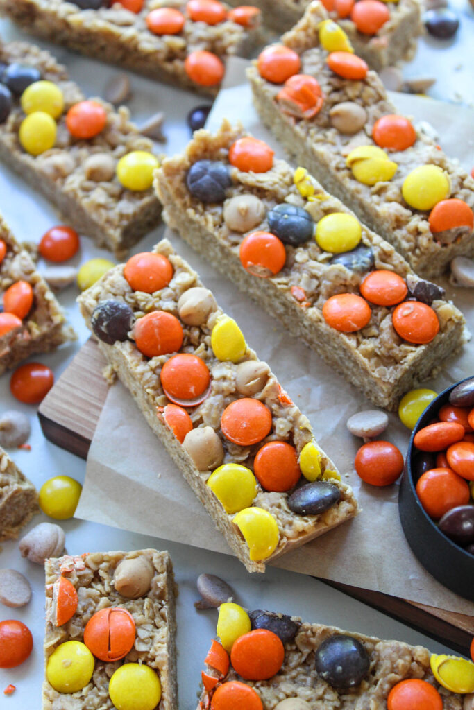 Close-up of homemade peanut butter granola bars with visible oats and peanut butter
