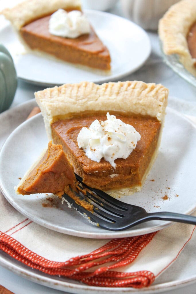 Classic vegan pumpkin pie baked in a golden pie crust