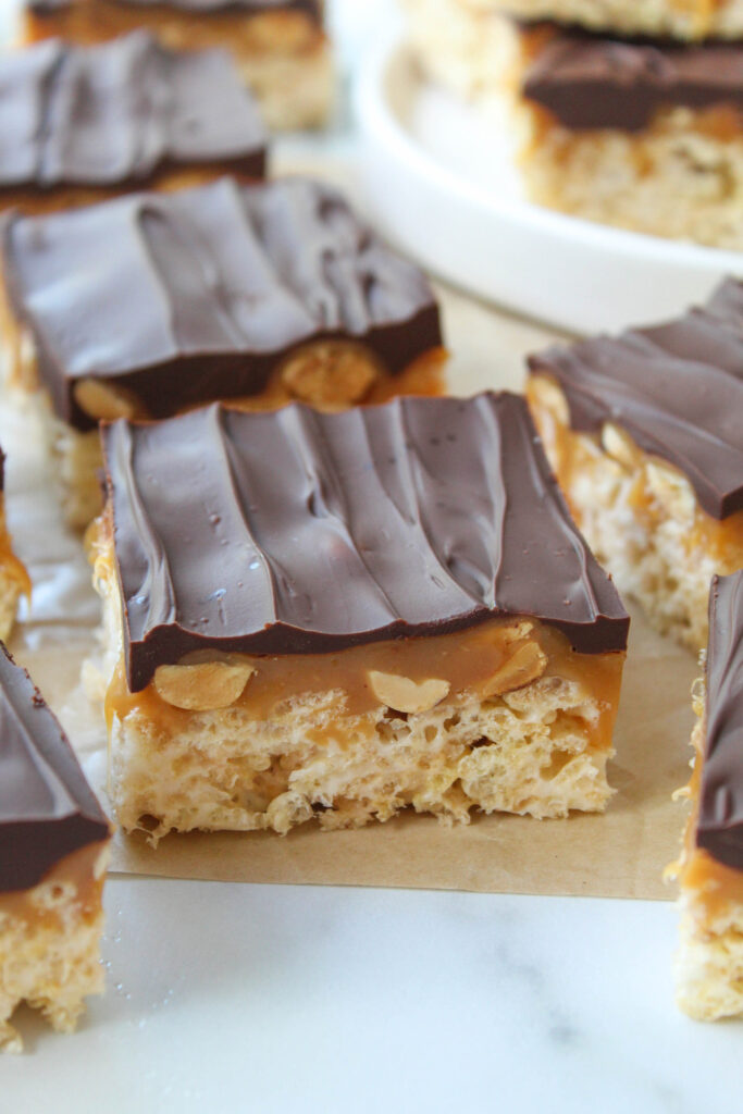 Homemade Snickers Rice Krispie bars cut into squares