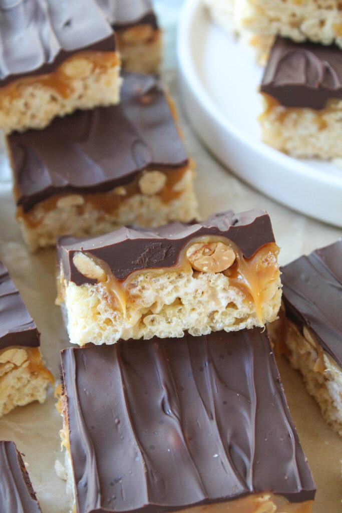 Family-friendly Snickers Rice Krispie treats ready to serve