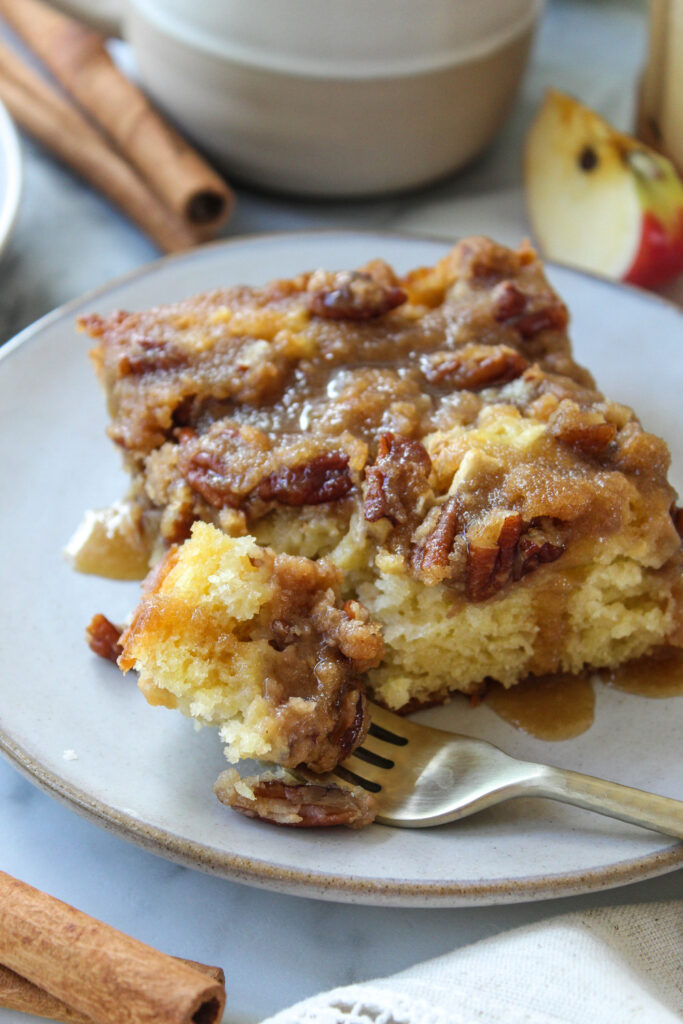 Apple coffee cake with a crunchy crumb topping and cinnamon apples