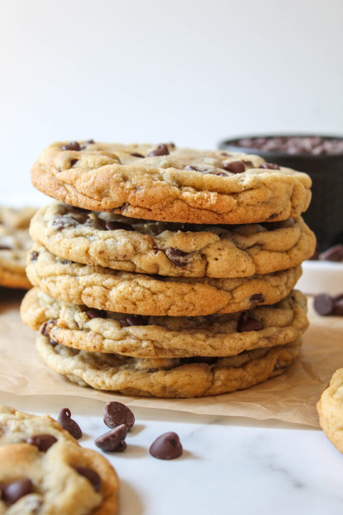 Bakery style chocolate chip cookies stacked