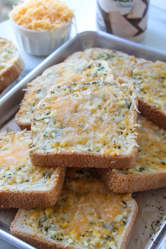Golden, crispy garlic cheese Texas toast topped with melted mozzarella and cheddar