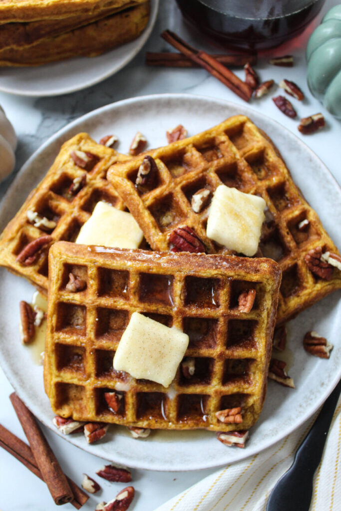 Fluffy pumpkin waffles prepared with canned pumpkin puree