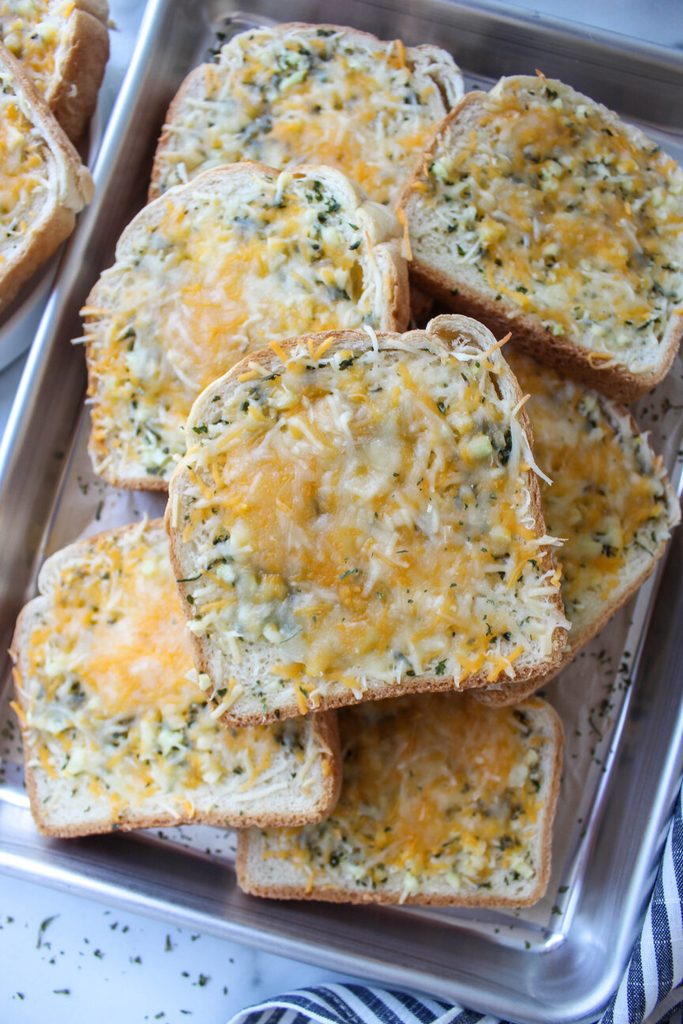 Cheesy garlic Texas toast with parmesan and herbs fresh from the oven