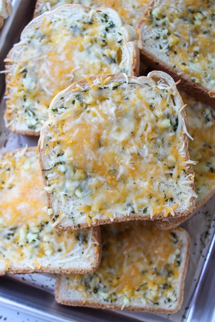 Buttery garlic cheese Texas toast with a crunchy, golden top