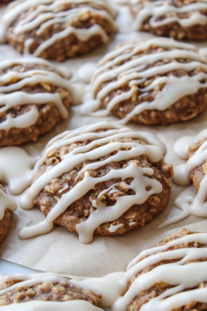 Close‑up of apple cinnamon oatmeal cookies showing chewy oats and apple pieces