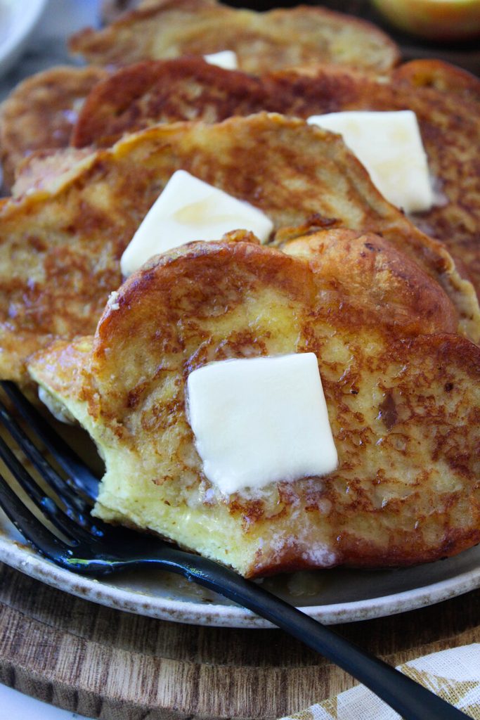 Close‑up of apple butter French toast showing caramelized edges and fluffy texture
