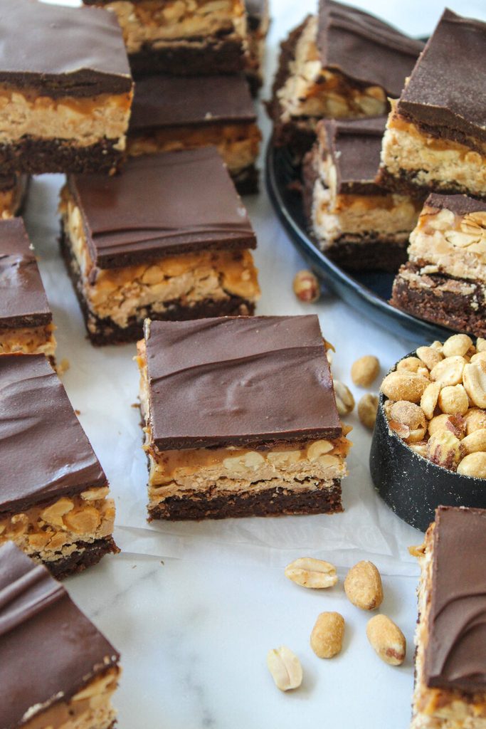 Fudgy Snickers brownies with gooey caramel and crunchy peanuts