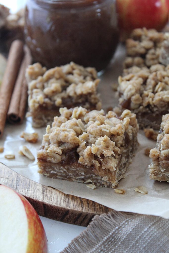 Close‑up of apple butter crumble bars showing thick layers and crumbly topping