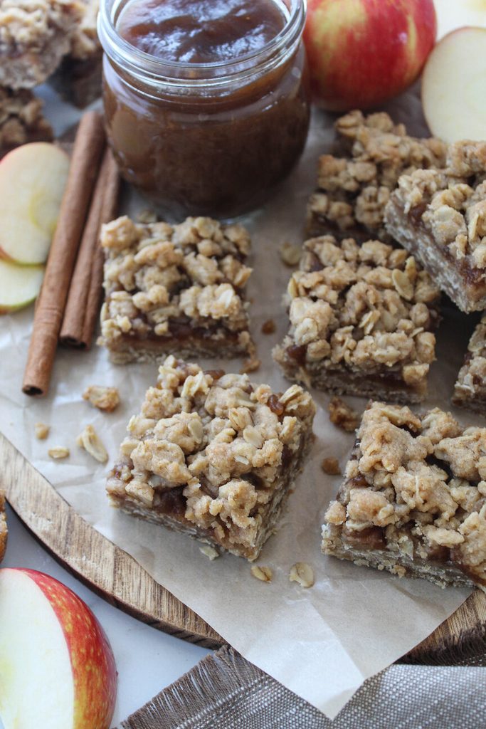 Apple butter bars cut into squares with a warm, cozy fall texture