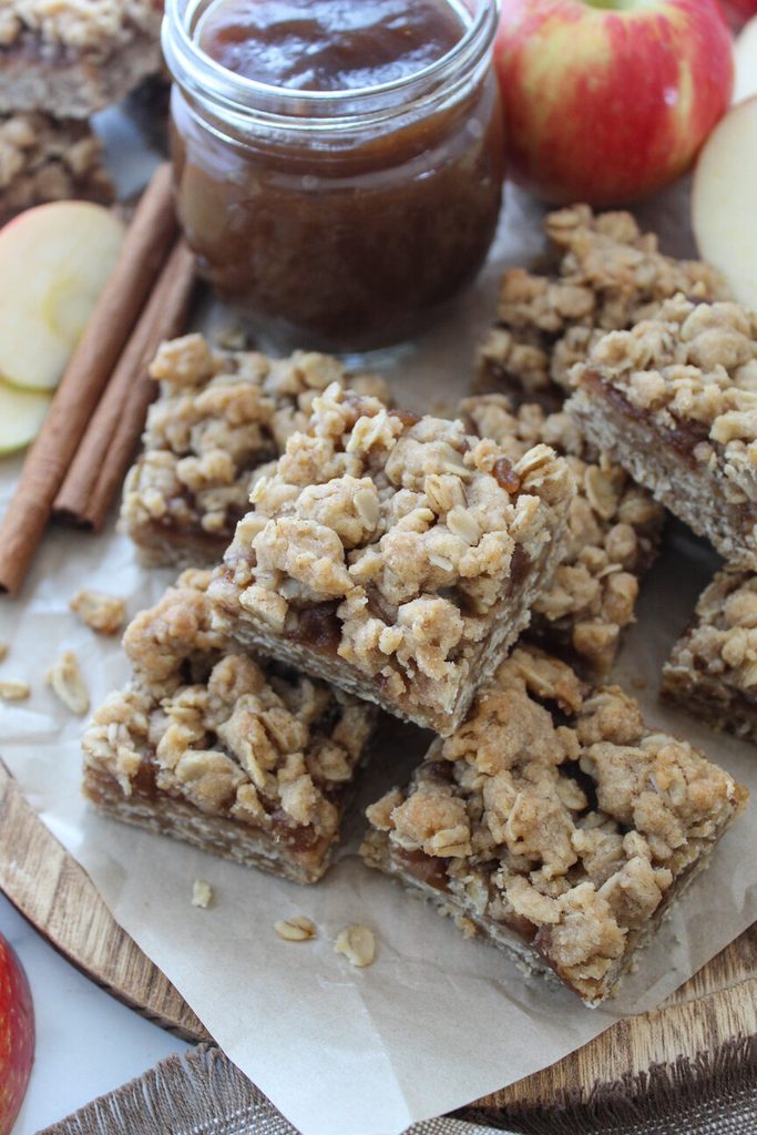 Stack of apple butter crumble bars with brown sugar oat topping