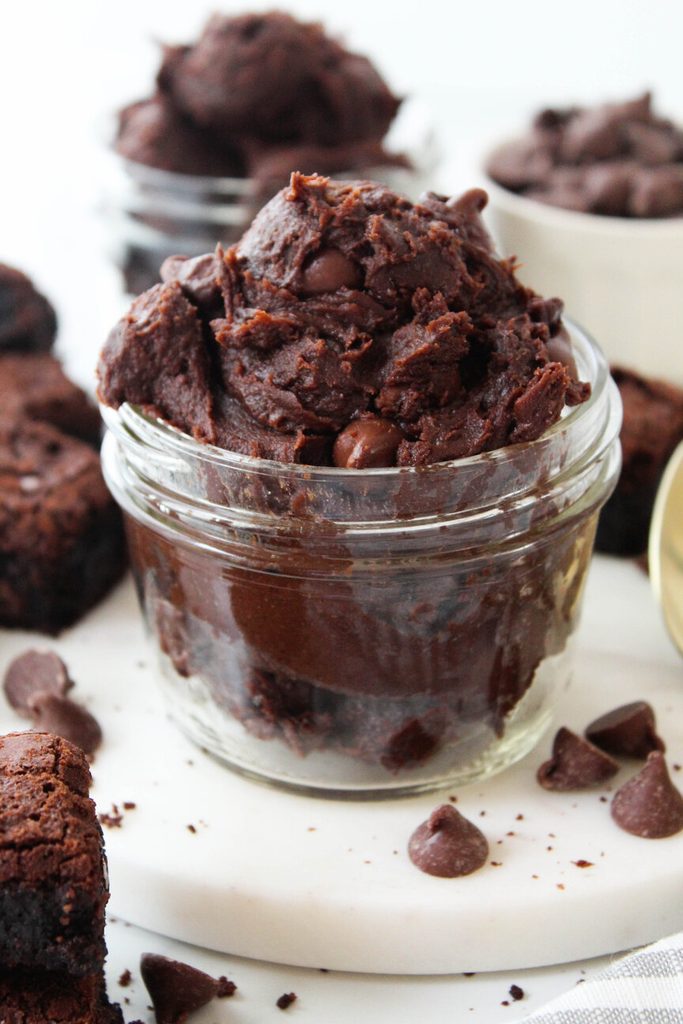 Close‑up of creamy edible brownie batter with chocolate chips