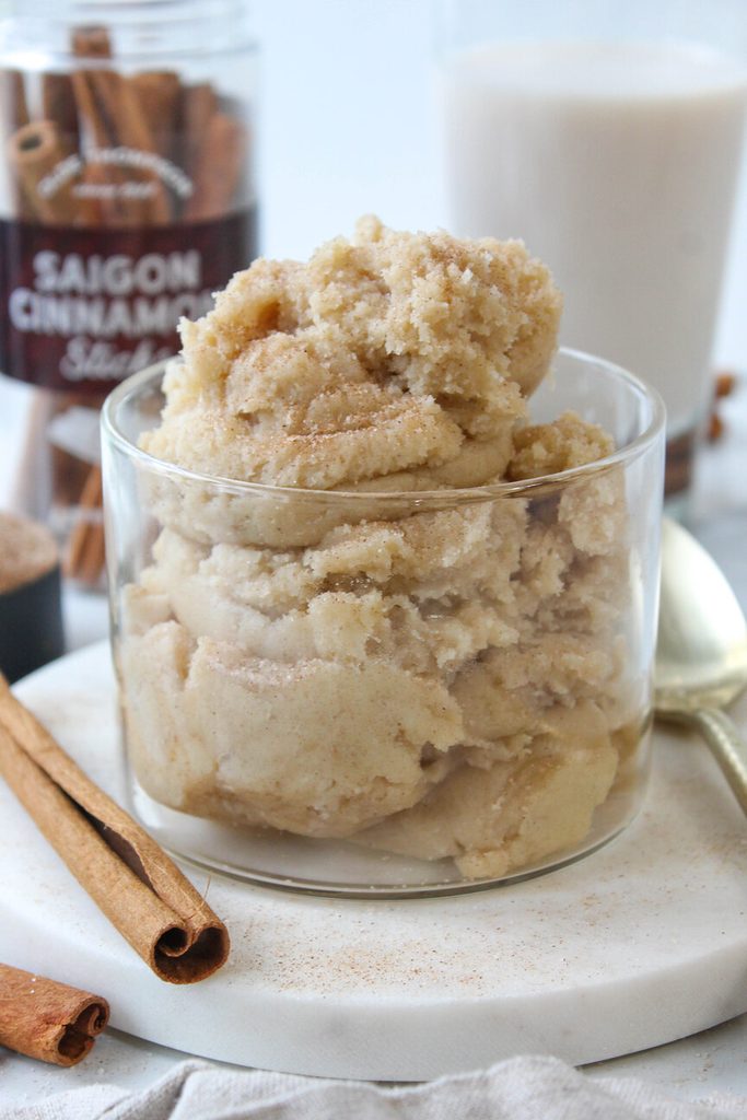 Edible snickerdoodle dough topped with extra cinnamon‑sugar for serving