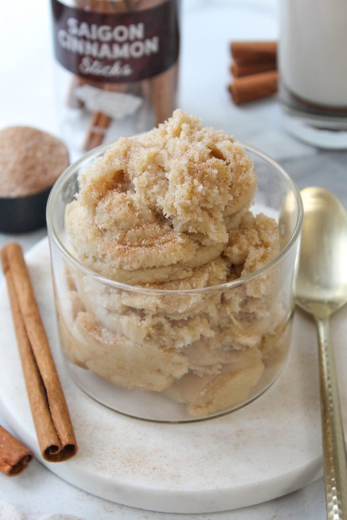 Overhead shot of edible snickerdoodle cookie dough with cinnamon dusting