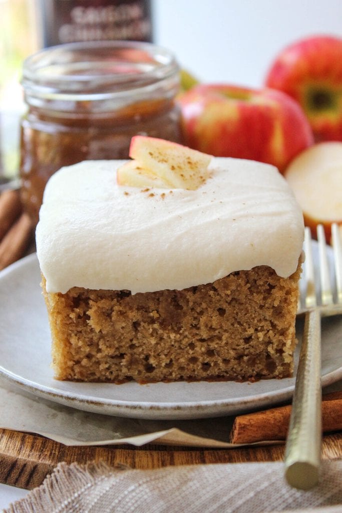Apple butter cake topped with cinnamon sugar and sliced apples