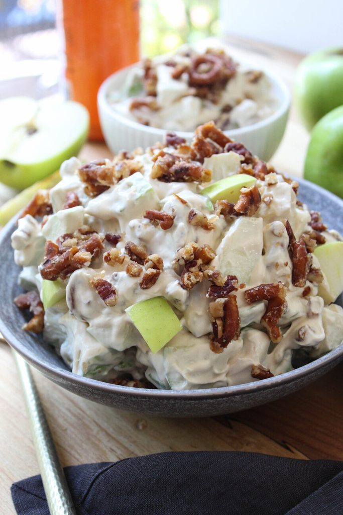 Caramel apple crackle salad on a fall‑themed table with apples around