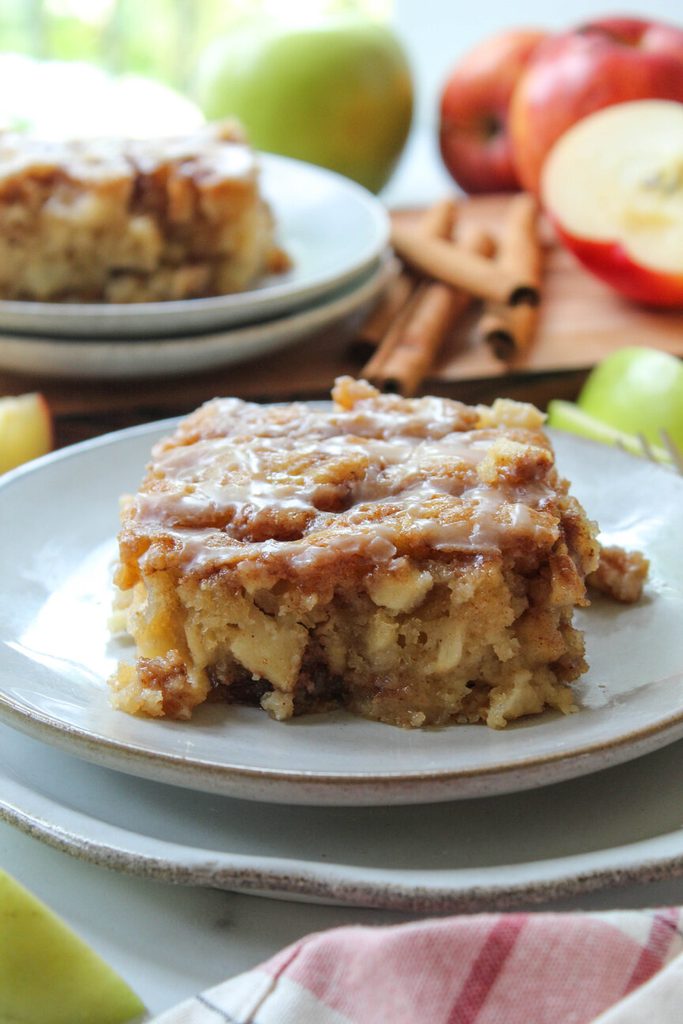 moist apple fritter cake with cinnamon swirl on a fall table

