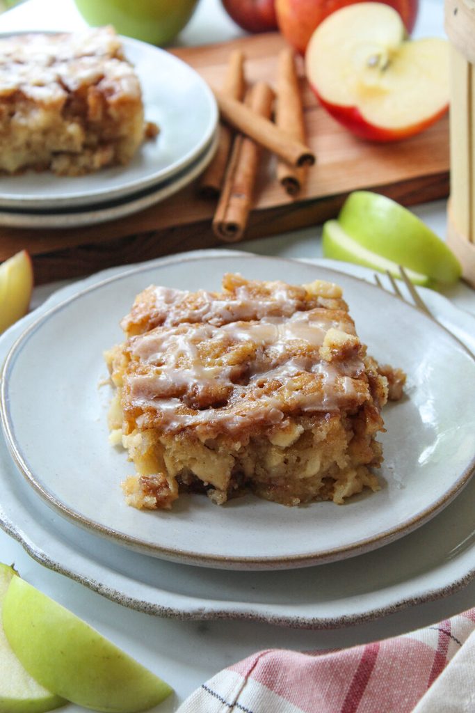 close‑up of glazed apple fritter cake slices showing tender crumb

